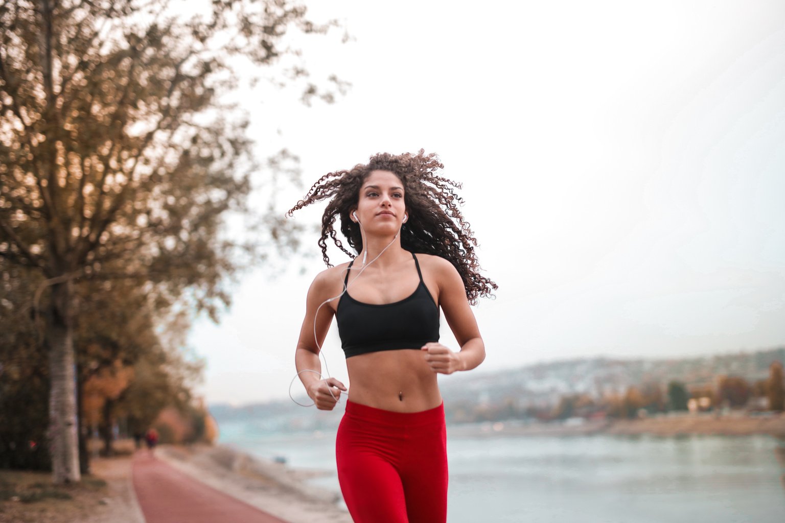 Woman in Black Sports Bra Running